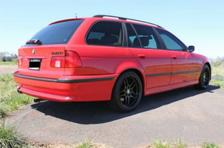 Illustration for article titled For $9,900, This 1999 BMW 540i Lets You Stick It To The Man